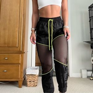 LF The Brand- windbreaker material parachute pants. LF monogram all over pants